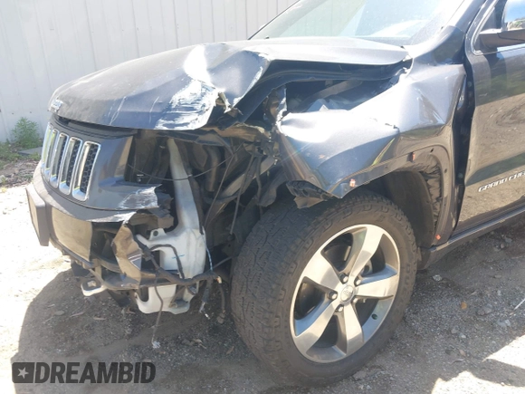 2015 Jeep Grand Cherokee Overland with VIN 1C4RJFCG7FC839778, listed as a IAAI auction lot 42490111 with 160,040 mi miles and . Bid and sale history available at DreamBid. Image 12.