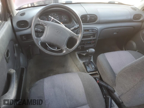 1997 Hyundai Accent с VIN KMHVF24N5VU369924, выставлен на аукционе Copart как лот 85036114 с пробегом 168 797 миль миль и Списание • Salvage title. История ставок и продаж доступна на DreamBid. Изображение 8.