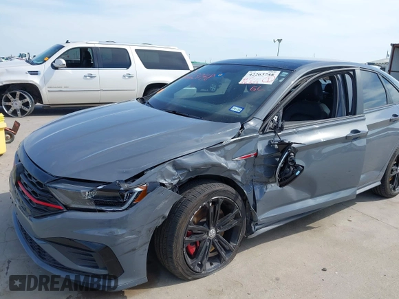 2020 Volkswagen Jetta GLI S z VIN 3VW6T7BU0LM047800, wystawiony jako IAAI lot #42263748 z przebiegiem 58 903 mil mil oraz . Historia ofert i sprzedaży dostępna na DreamBid. Obrazek 6.