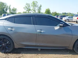 2017 Nissan Maxima SV z VIN 1N4AA6AP7HC454942, wystawiony jako IAAI lot #42447538 z przebiegiem 199 525 mil mil oraz . Historia ofert i sprzedaży dostępna na DreamBid. Obrazek 14.