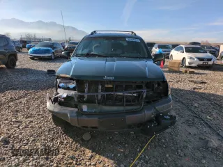 2001 Jeep Grand Cherokee Laredo with VIN 1J4GW48N21C570404, listed as a Copart auction lot 85996954 with 153,838 mi miles and Salvage Title. Bid and sale history available at carsss.com. Image 5.
