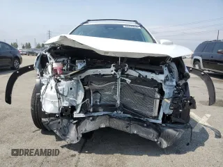 2024 Toyota Corolla Cross XLE with VIN 7MUDAABG4RV105641, listed as a Copart auction lot 58950855 with 5,805 mi miles and Salvage title. Bid and sale history available at DreamBid. Image 5.