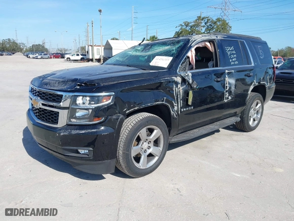 2018 Chevrolet Tahoe LT with VIN 1GNSCBKCXJR132867, listed as a IAAI auction lot 41456319 with 59,131 mi miles. Bid and sale history available at carsss.com. Image 21.