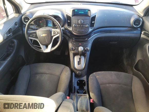 2012 Chevrolet Orlando 1LT z VIN KL77P2EM9CK580954, wystawiony jako Copart lot #83370534 z przebiegiem 214 895 mil mil oraz Szkody całkowita. Historia ofert i sprzedaży dostępna na DreamBid. Obrazek 8.