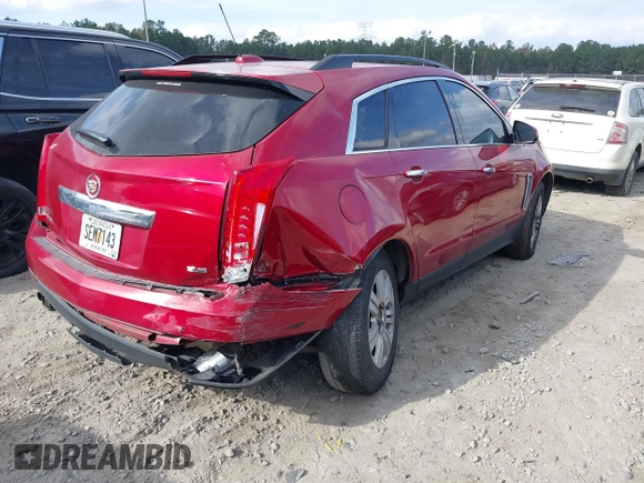 2015 Cadillac SRX z VIN 3GYFNAE3XFS572970, wystawiony jako IAAI lot #40854902 z przebiegiem 124 779 mil mil oraz . Historia ofert i sprzedaży dostępna na DreamBid. Obrazek 4.