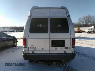 2012 Ford Econoline Passenger XL z VIN 1FMNE1BW4CDA93080, wystawiony jako IAAI lot #41103198 z przebiegiem Nie podano mil oraz . Historia ofert i sprzedaży dostępna na DreamBid. Obrazek 16.
