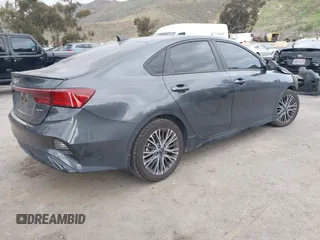 2023 Kia Forte GT-Line z VIN 3KPF54ADXPE598362, wystawiony jako IAAI lot #41857738 z przebiegiem 64 208 mil mil oraz . Historia ofert i sprzedaży dostępna na DreamBid. Obrazek 4.