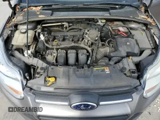 2013 Ford Focus SE z VIN 1FADP3F25DL149392, wystawiony jako Copart lot #82422434 z przebiegiem 169 525 mil mil oraz Szkody całkowita. Historia ofert i sprzedaży dostępna na DreamBid. Obrazek 12.