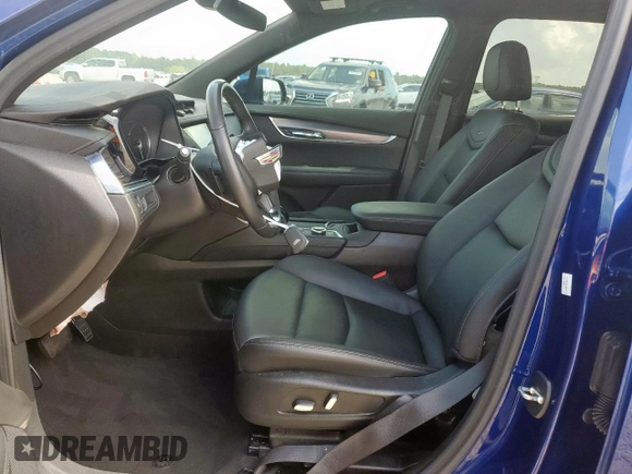 2023 Cadillac XT6 FWD Luxury с VIN 1GYKPAR42PZ167668, выставлен на аукционе Copart как лот 62093575 с пробегом 32 212 миль миль и Списание • Salvage title. История ставок и продаж доступна на DreamBid. Изображение 7.
