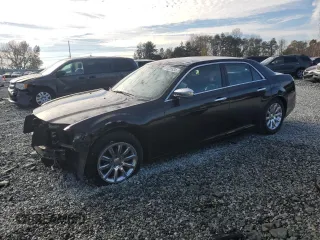 2012 Chrysler 300 Limited with VIN 2C3CCACG2CH265929, listed as a Copart auction lot 81236934 with 202,067 mi miles and Salvage title. Bid and sale history available at DreamBid. Image 1.