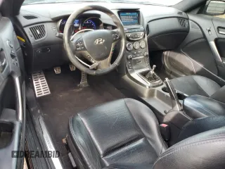 2013 Hyundai Genesis Coupe Track z VIN KMHHU6KJ4DU089727, wystawiony jako Copart lot #50002495 z przebiegiem 99 869 mil mil oraz Szkoda całkowita • Salvage title. Historia ofert i sprzedaży dostępna na DreamBid. Obrazek 8.