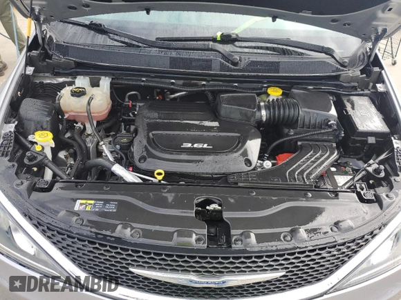 2017 Chrysler Pacifica Touring L with VIN 2C4RC1BG2HR552731, listed as a Copart auction lot 75826124 with Not Provided miles and Salvage Title. Bid and sale history available at DreamBid. Image 12.