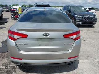 2012 Kia Optima SX with VIN 5XXGR4A67CG066935, listed as a IAAI auction lot 41989589 with 80,420 mi miles and . Bid and sale history available at carsss.com. Image 16.