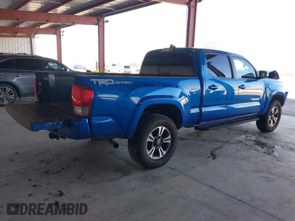 2017 Toyota Tacoma SR5 with VIN 3TMBZ5DN1HM009204, listed as a IAAI auction lot 41301765 with 129,923 mi miles and . Bid and sale history available at DreamBid. Image 4.