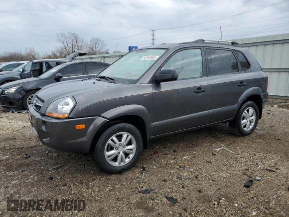 2009 Hyundai Tucson GLS with VIN KM8JM12B79U042597, listed as a Copart auction lot 52164465 with 90,943 mi miles and Salvage Title. Bid and sale history available at carsss.com. Image 1.