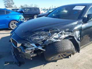 2014 BMW 4 Series 428i with VIN WBA3N7C55EK221259, listed as a IAAI auction lot 41322781 with 100,274 mi miles and . Bid and sale history available at carsss.com. Image 6.