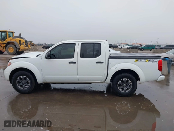 2014 Nissan Frontier SV with VIN 1N6AD0ER6EN751448, listed as a IAAI auction lot 41514633 with 238,204 mi miles and . Bid and sale history available at DreamBid. Image 14.