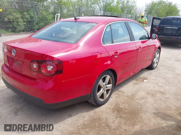 2008 Volkswagen Jetta SE z VIN 3VWRM71KX8M054187, wystawiony jako IAAI lot #42279897 z przebiegiem 179 228 mil mil oraz . Historia ofert i sprzedaży dostępna na DreamBid. Obrazek 4.