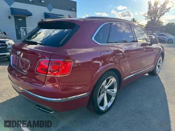 2017 Bentley Bentayga W12 z VIN SJAAC2ZV1HC014037, wystawiony jako Copart lot #54799655 z przebiegiem 36 099 mil mil oraz Szkody całkowita. Historia ofert i sprzedaży dostępna na DreamBid. Obrazek 3.