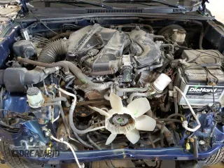 2015 Toyota Tacoma with VIN 3TMLU4EN6FM186016, listed as a Copart auction lot 58404675 with 127,536 mi miles and Salvage title. Bid and sale history available at DreamBid. Image 11.
