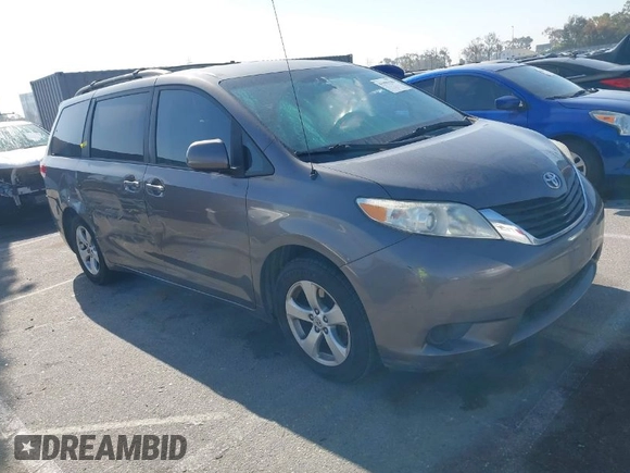 2014 Toyota Sienna LE AAS with VIN 5TDKK3DC6ES521706, listed as a IAAI auction lot 41999188 with 104,867 mi miles. Bid and sale history available at carsss.com. Image 1.