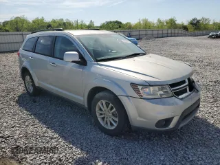 2014 Dodge Journey SXT z VIN 3C4PDCBG7ET126901, wystawiony jako Copart lot #52882625 z przebiegiem 176 923 mil mil oraz Szkoda całkowita • Salvage title. Historia ofert i sprzedaży dostępna na DreamBid. Obrazek 4.