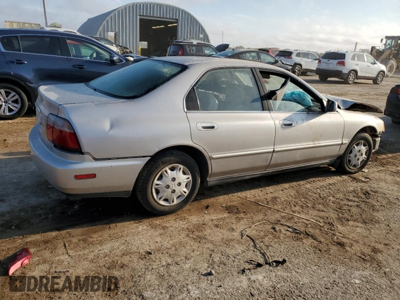 1997 Honda Accord Value with VIN 1HGCD5684VA168495, listed as a Copart auction lot 71716984 with 202,854 mi miles and Salvage Title. Bid and sale history available at DreamBid. Image 3.