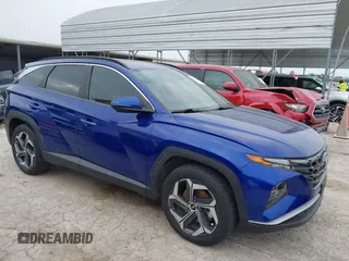2022 Hyundai Tucson SEL z VIN 5NMJC3AE7NH004397, wystawiony jako IAAI lot #42163872 z przebiegiem 42 666 mil mil oraz . Historia ofert i sprzedaży dostępna na DreamBid. Obrazek 1.