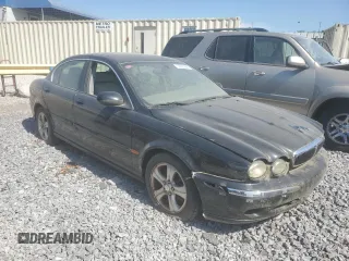2002 Jaguar X-Type z VIN SAJEA51C02WC53526, wystawiony jako Copart lot #53761265 z przebiegiem 156 584 mil mil oraz Czysty tytuł • Clean title. Historia ofert i sprzedaży dostępna na DreamBid. Obrazek 4.