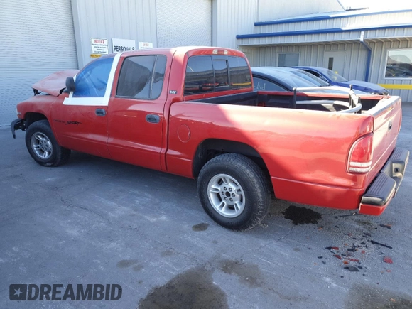 2000 Dodge Dakota Sport with VIN 1B7GL2AZ4YS722151, listed as a Copart auction lot 87870705 with 169,435 mi miles and Salvage Title. Bid and sale history available at DreamBid. Image 2.
