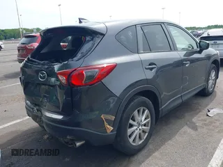2016 Mazda CX-5 Touring z VIN JM3KE4CY4G0692655, wystawiony jako IAAI lot #42318657 z przebiegiem 212 826 mil mil oraz . Historia ofert i sprzedaży dostępna na DreamBid. Obrazek 4.