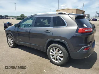 2014 Jeep Cherokee Limited with VIN 1C4PJMDS4EW211057, listed as a Copart auction lot 63448375 with Not provided miles and Salvage title. Bid and sale history available at DreamBid. Image 2.