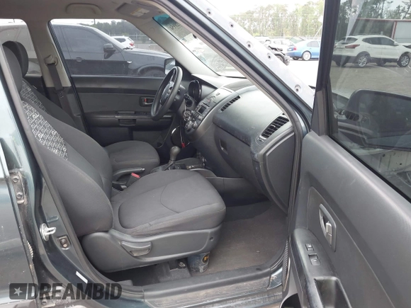 2011 Kia Soul + with VIN KNDJT2A29B7346601, listed as a IAAI auction lot 42128954 with 247,952 mi miles. Bid and sale history available at carsss.com. Image 5.