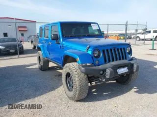 2016 Jeep Wrangler Unlimited 75th Anniversary with VIN 1C4BJWEG7GL179001, listed as a IAAI auction lot 42030735 with 123,681 mi miles. Bid and sale history available at carsss.com. Image 1.