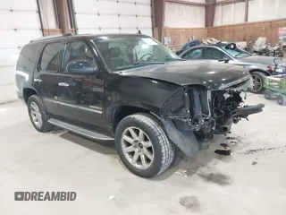 2013 GMC Yukon Denali with VIN 1GKS2EEF0DR105804, listed as a IAAI auction lot 42028402 with 121,054 mi miles. Bid and sale history available at carsss.com. Image 1.