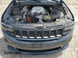 2018 Jeep Grand Cherokee Trackhawk with VIN 1C4RJFN99JC309254, listed as a Copart auction lot 64061615 with 104,558 mi miles and Clean title. Bid and sale history available at DreamBid. Image 12.