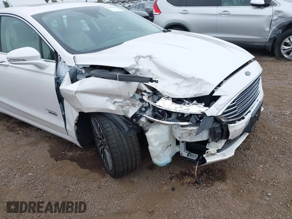 2017 Ford Fusion Titanium with VIN 3FA6P0SU2HR379834, listed as a IAAI auction lot 42440382 with 55,646 mi miles and . Bid and sale history available at DreamBid. Image 6.