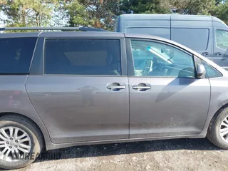 2014 Toyota Sienna XLE z VIN 5TDYK3DC4ES493852, wystawiony jako IAAI lot #42096495 z przebiegiem 145 943 mil mil oraz . Historia ofert i sprzedaży dostępna na DreamBid. Obrazek 13.