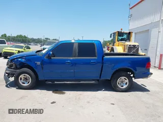 2001 Ford F-150 XLT with VIN 1FTRW07W01KE90204, listed as a IAAI auction lot 42289853 with Not provided miles and . Bid and sale history available at DreamBid. Image 14.