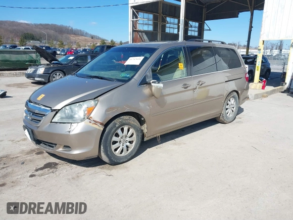 2006 Honda Odyssey EX z VIN 5FNRL384X6B459148, wystawiony jako IAAI lot #41747616 z przebiegiem 158 995 mil mil oraz . Historia ofert i sprzedaży dostępna na DreamBid. Obrazek 2.