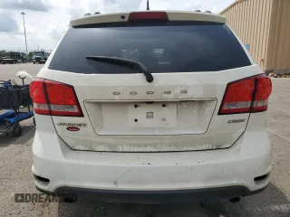 2012 Dodge Journey SXT with VIN 3C4PDCCG4CT243492, listed as a Copart auction lot 59908485 with 319,175 mi miles and Salvage title. Bid and sale history available at DreamBid. Image 6.