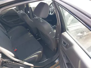 2015 Ford Fiesta SE with VIN 3FADP4BJ6FM150720, listed as a IAAI auction lot 41733922 with 98,336 mi miles. Bid and sale history available at carsss.com. Image 8.
