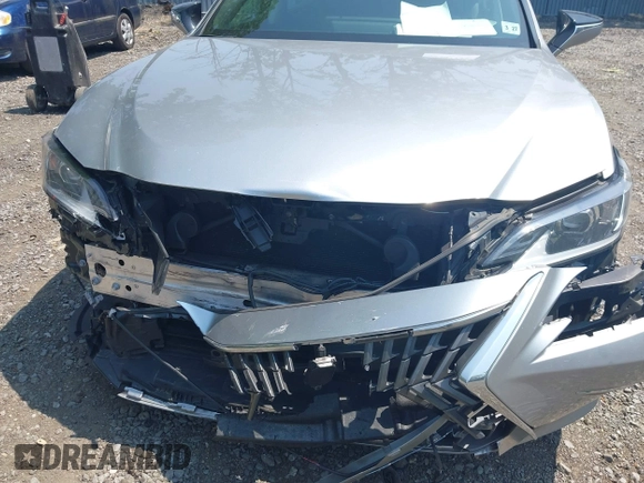 2022 Lexus ES 300h with VIN 58ADA1C13NU017386, listed as a IAAI auction lot 42381143 with 53,045 mi miles and . Bid and sale history available at DreamBid. Image 6.