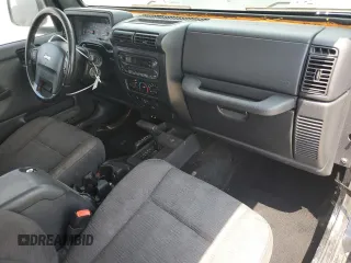 2005 Jeep Wrangler X z VIN 1J4FA39S75P321328, wystawiony jako Copart lot #59711505 z przebiegiem 126 768 mil mil oraz Szkoda całkowita • Salvage title. Historia ofert i sprzedaży dostępna na DreamBid. Obrazek 8.
