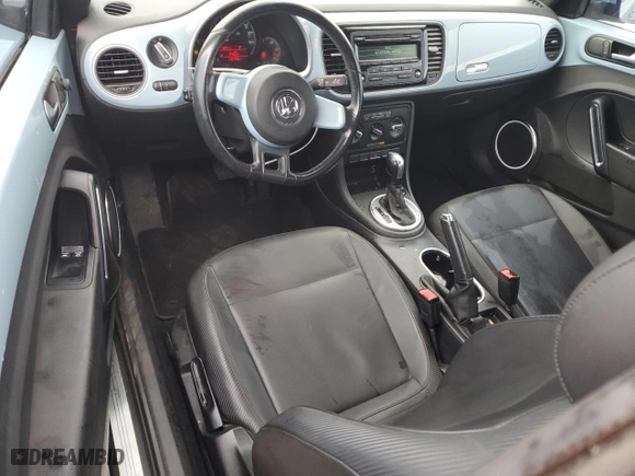 2012 Volkswagen Beetle 2.5L PZEV with VIN 3VWJP7AT1CM652433, listed as a Copart auction lot 85989164 with 115,406 mi miles and Salvage Title. Bid and sale history available at carsss.com. Image 8.