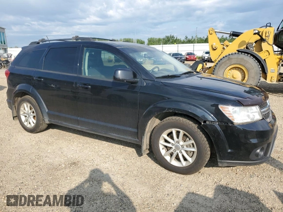 2015 Dodge Journey SXT with VIN 3C4PDCCG5FT559021, listed as a Copart auction lot 60101335 with 323,930 mi miles and Salvage title. Bid and sale history available at DreamBid. Image 4.