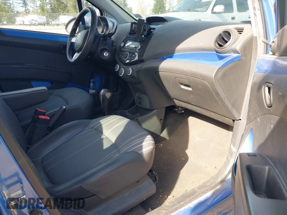 2015 Chevrolet Spark LS with VIN KL8CB6S94FC751401, listed as a IAAI auction lot 42032919 with 61,149 mi miles and . Bid and sale history available at DreamBid. Image 5.