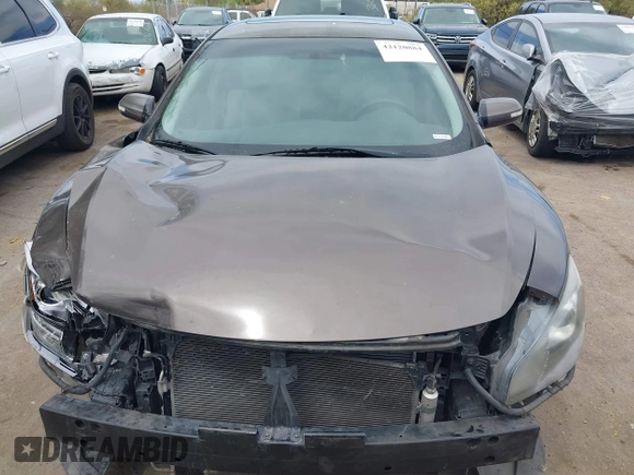 2014 Nissan Maxima S with VIN 1N4AA5AP0EC431251, listed as a IAAI auction lot 42120884 with 163,628 mi miles and . Bid and sale history available at DreamBid. Image 13.