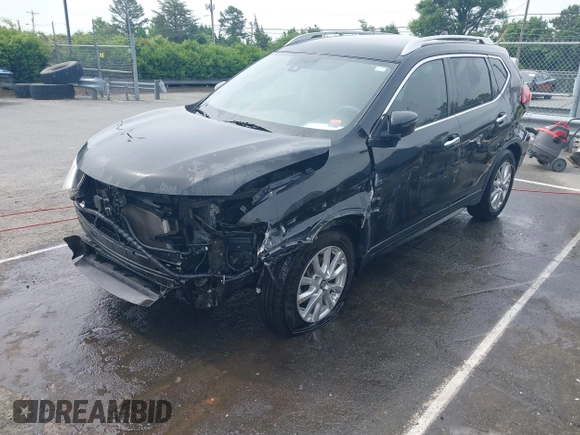 2019 Nissan Rogue SV with VIN JN8AT2MT1KW261931, listed as a IAAI auction lot 42274227 with 141,518 mi miles and . Bid and sale history available at DreamBid. Image 17.