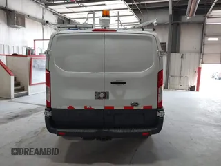 2015 Ford Transit Cargo with VIN 1FTNR1ZM2FKA55134, listed as a IAAI auction lot 42193601 with 96,231 mi miles and . Bid and sale history available at DreamBid. Image 16.
